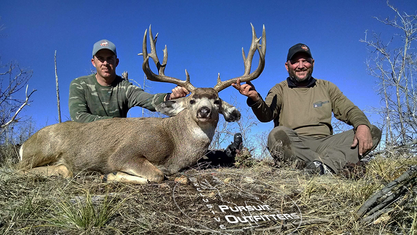 EPO guides, John & Jimmy holding Steve's big buck. 