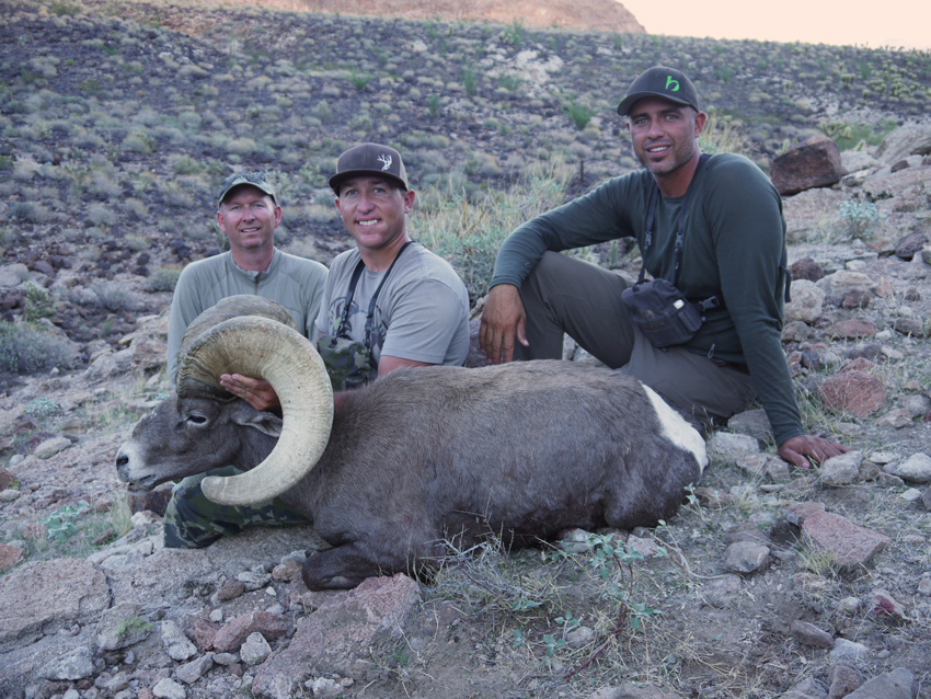 Jay Scott, Hunter Haynes & Craig Steele pose for one final image with this majestic bighorn ram. 
